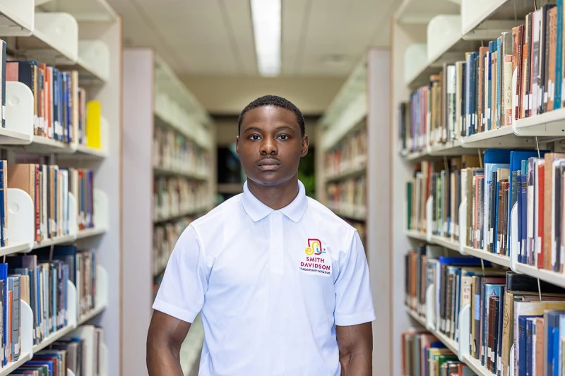College student in library