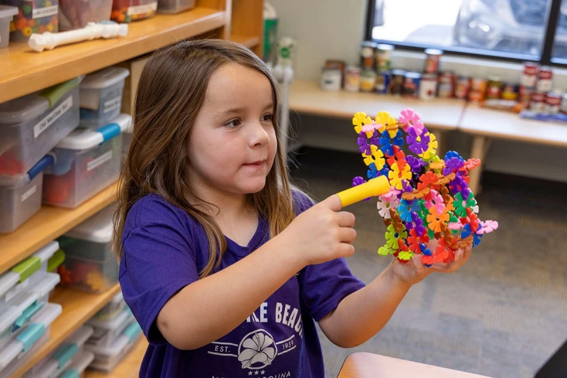 Child playing with toy
