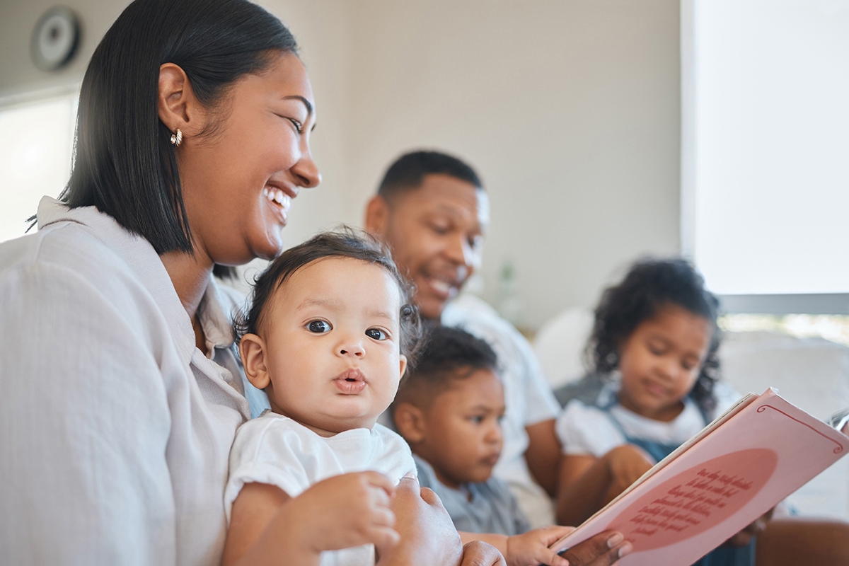 Family reading a book